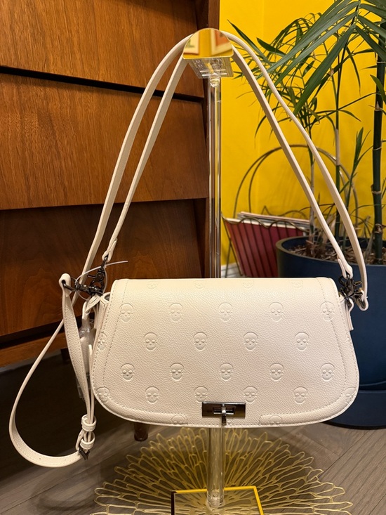 Betsey Johnson Handbags - Betsey Johnson White/Cream Embossed Skull Crossbody Bag - Women's Shoulder Bag